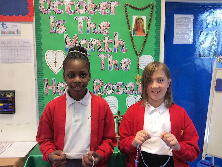 Children praying the Rosary